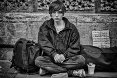Portrait of a young homeless boy at 17